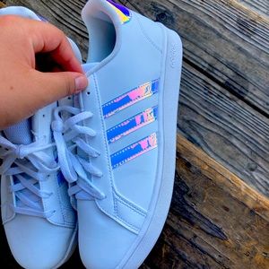 Woman’s holographic Adidas